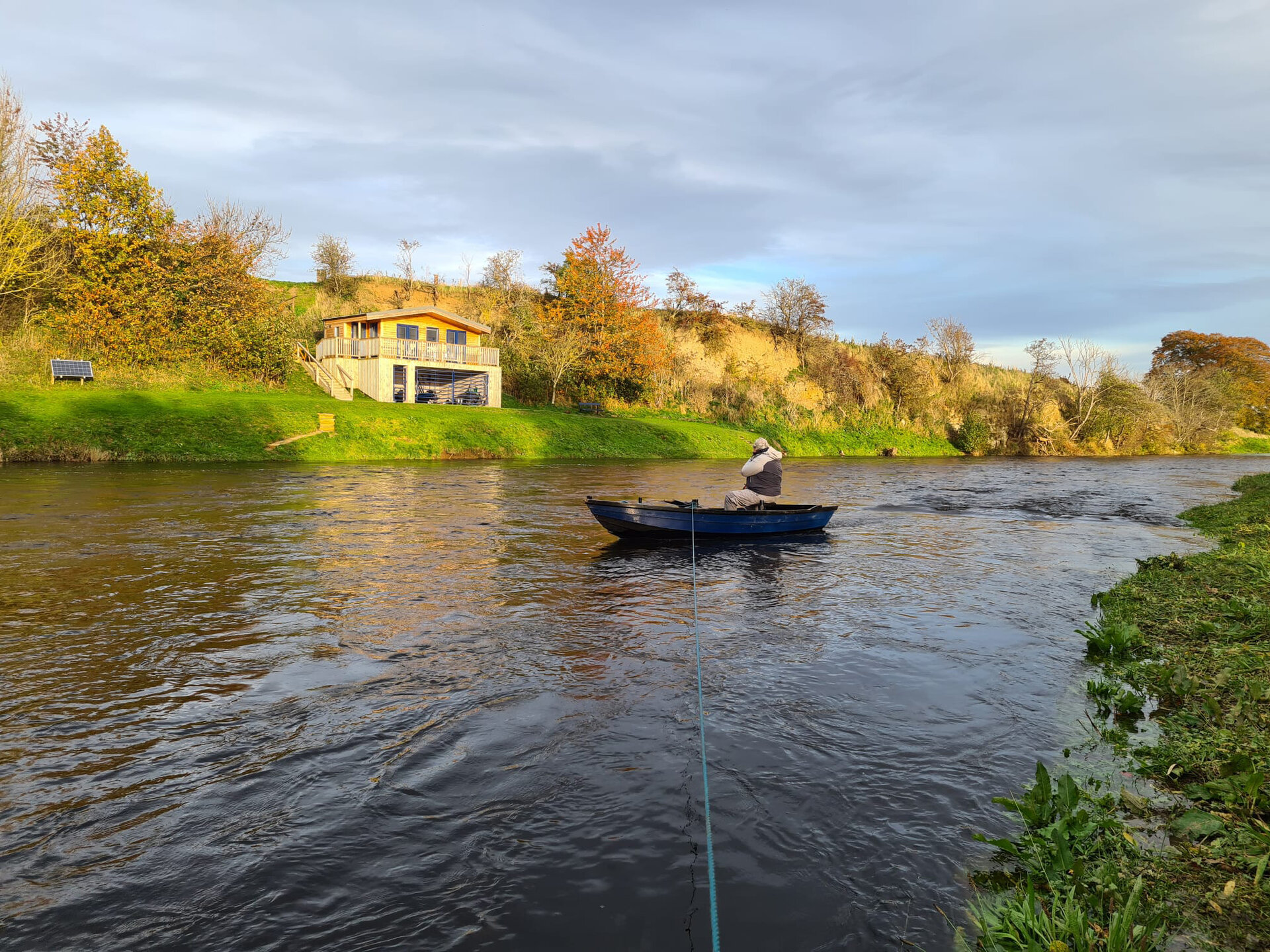 The fishing hut and boat on the River Tweed at Upper North Wark