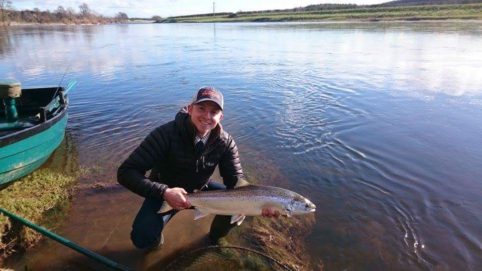 An angler with a salmon caught at Upper North Wark